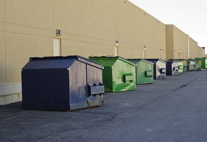 metallic dumpster units staged for construction garbage in Broad Brook CT